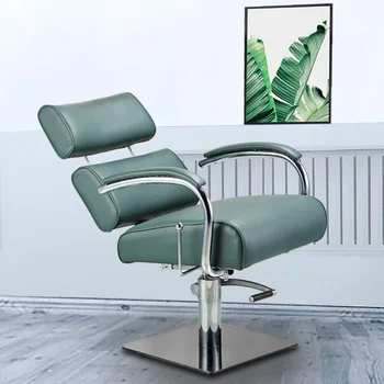 Парикмахерское кресло Кресло в парикмахерской может вращаться и поднимать спинку, чтобы опустить салон высокого класса